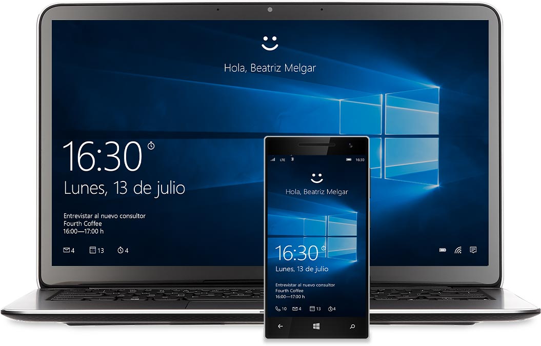 Un equipo portátil y un teléfono con la pantalla Inicio de Windows 10. Hay una carita sonriente encima de cada uno con las palabras “Hello Miranda Vance”