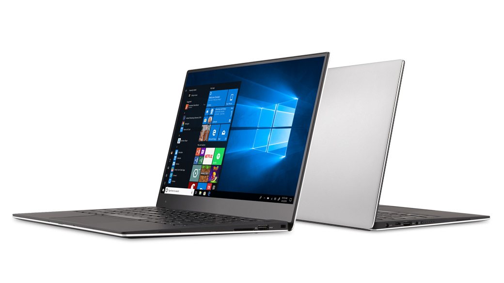 Zwei aneinander angelehnte Windows 10-Laptops