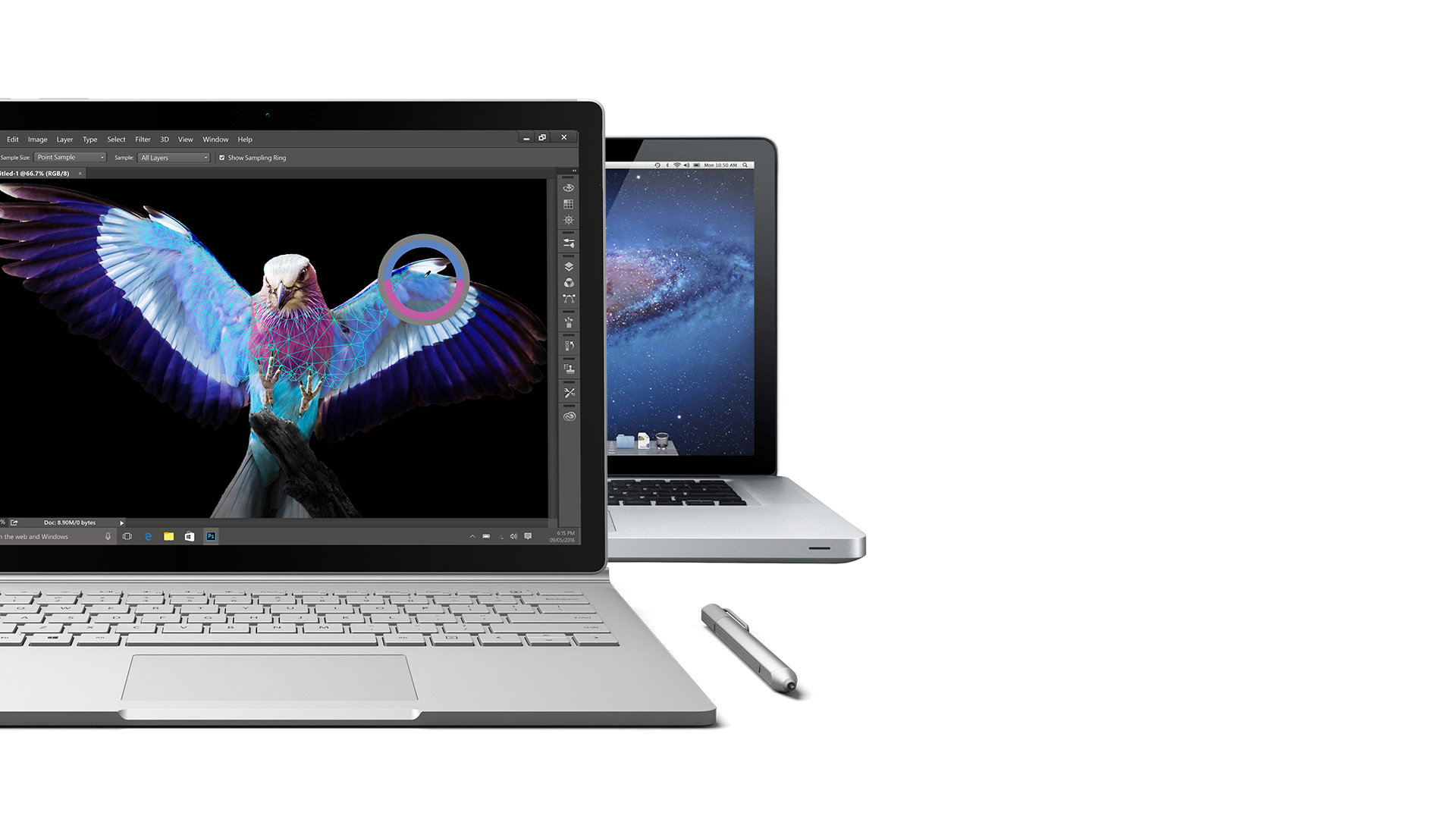 Surface Book open facing front with Surface Pen and a MacBook Pro in the background
