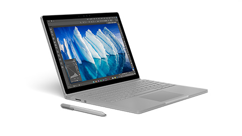 Surface Book in laptop mode facing right with Surface Pen