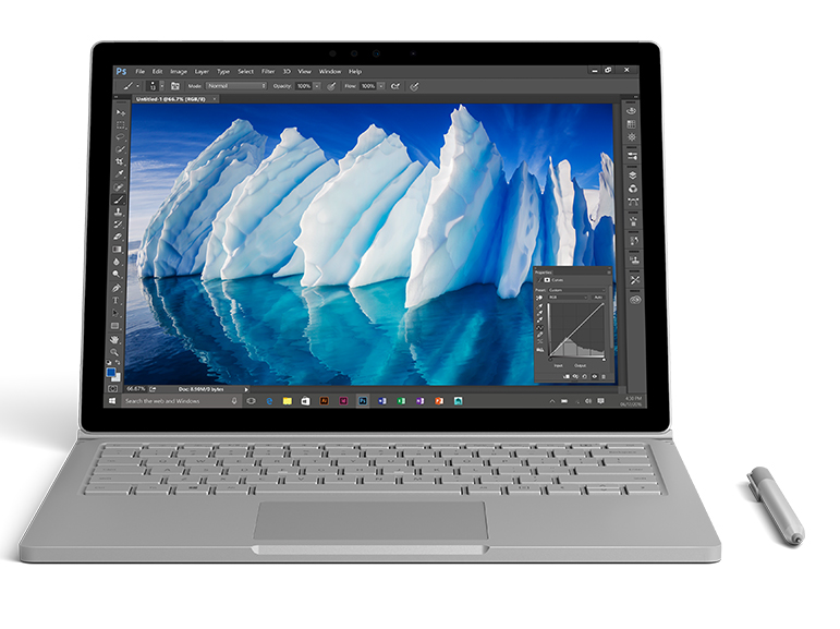 Surface Book facing front with image of an iceberg open in Photoshop