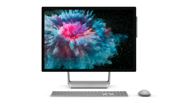 Surface Studio 2 front view with Surface Keyboard and Surface Mouse